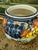 Design Plus Gallery presents a Contemporary Italian Majolica Urn. The ceramic vase has vibrant, hand-painted fruit with...