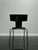 A refined postmodern design by John Hutton for Donghia, the Anziano chair pairs a sculptural curved back with a slender...
