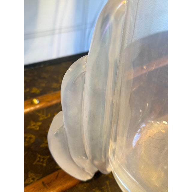 This spectacular vase boasts a highly unusual golden color and iridescent reflections that shift depending on the...