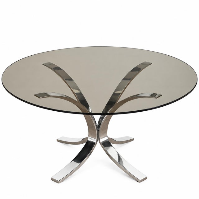 European vintage Space Age / Mid-Century Modern smoked-glass and polished-chrome coffee table, circa 1970s.