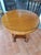 Round oak coffee table – English, restored. Elegant round coffee table from England, crafted from oak and featuring a...