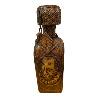 Mid 20th Century Leather Wrapped Glass Decanter With Embossed Don Quixote Figure by Miguel De Cervantes Poems For Sale