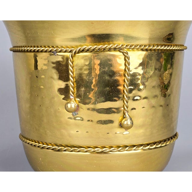 Large Vintage Hand Hammered Brass Planter This lovely planter is made from solid lacquered brass and features a hand-...