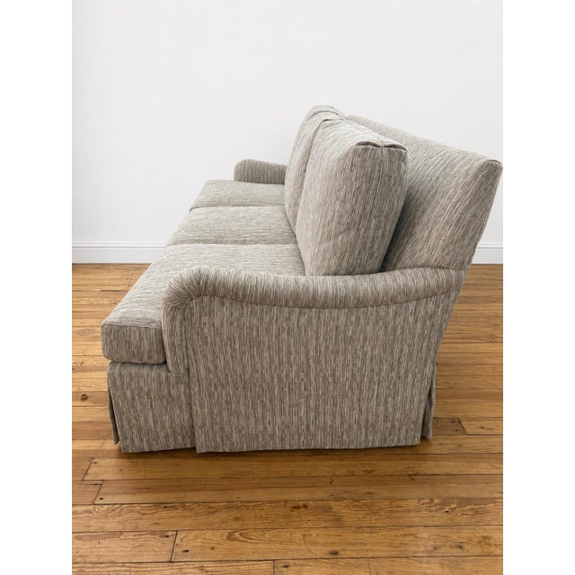 Transitional Kravet Tailor Sofa. Maple Frame - A Classic Design Featuring Rolled Arms, Skirted Bottom. Upholstered in a Slub Weave in Tones of Ivory, Taupe & Gray. For Sale - Image 3 of 6