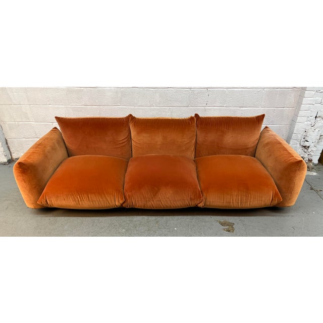 Iconic Marenco three-seater sofa designed by Mario Marenco for Arflex, celebrated for its sculptural silhouette, generous...