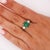 GIA certified 3.38 carat Colombian emerald ring in platinum featuring 0.70 carat princess cut diamonds with intricate...