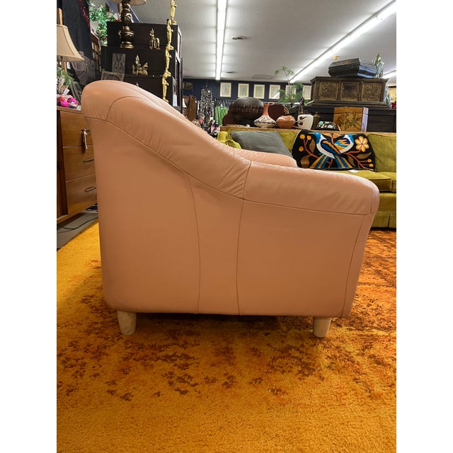 The leather seams create sleek modern shape and style. This leather sofa features small birch legs measuring 4.5 inches....