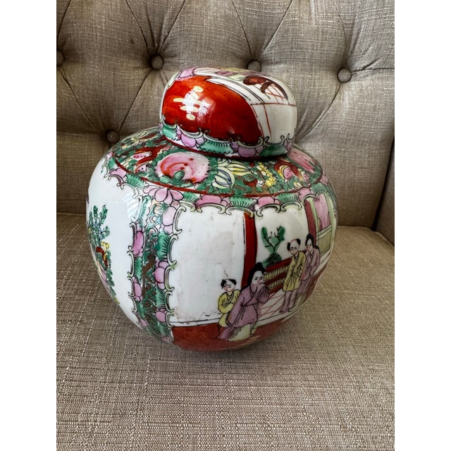 Beautiful vintage Chinese porcelain ginger jar featuring traditional famille rose decoration. this elegant piece is richly...