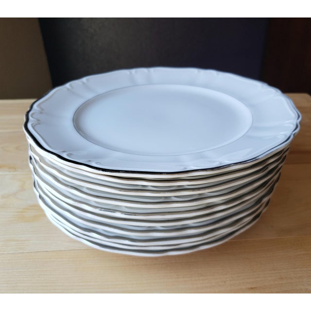 Elevate your tablescape with this elegant set of 10 dinner plates from Harmony House in the beloved "Silver Sonata"...