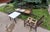 Vintage 1970 real bamboo patio set. Set of 4 pieces! Includes a swivel chair, side chair, coffee table and 3- piece sofa....