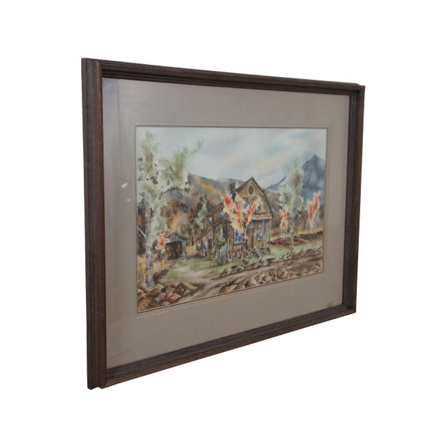 Vintage 1975 watercolor on paper painting titled "Dave's House" by Dean Toomy, showing a country cabin nestled among hills...