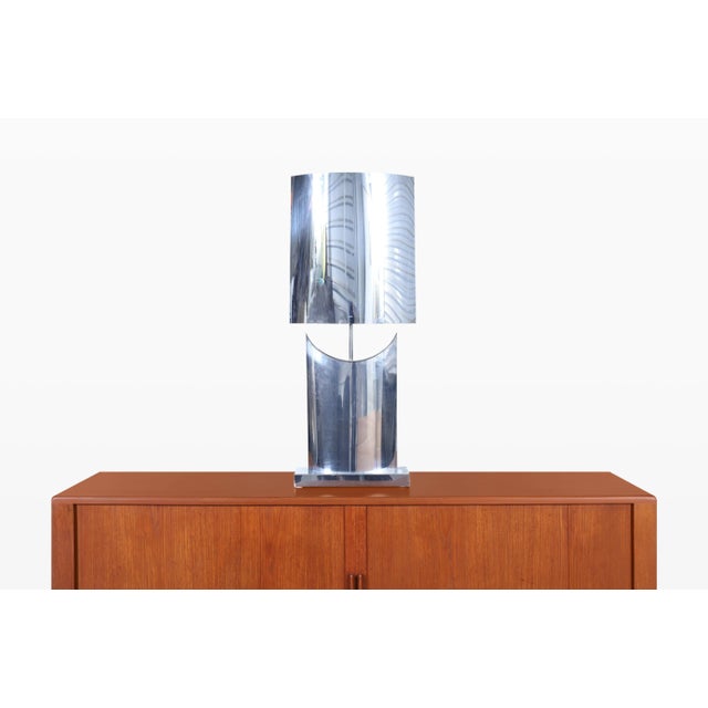 Mid-century modern chrome table lamp by Curtis Jere, USA, 1970s. This rare signed example showcases the sculptural vision...