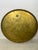 This vintage round solid brass tray is a beautiful decorative piece that is now available for sale. It features an...