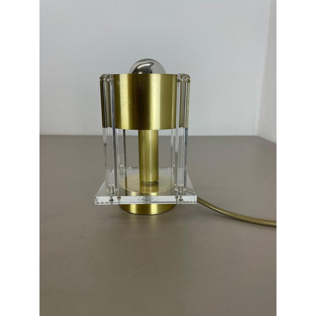 Article: table light Origin: Italy Age: 1970s This vintage table light was produced in Italy in the 1970s in Italy. It is...