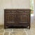 An 18th century Country French Louis XV buffet in solid oak, glowing with a deep, rich patina earned over centuries of...
