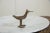 :: Vintage handmade African bronze flat billed bird. Circa mid 20th century and possibly older, this piece has such...