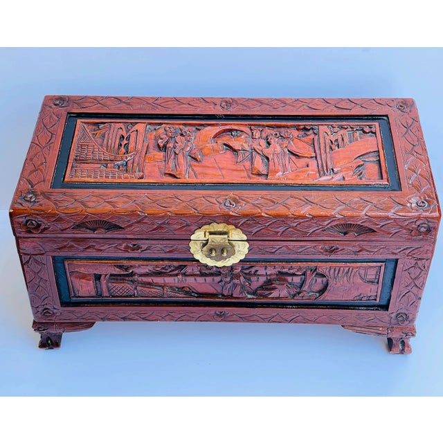 Chinese Asian antique handcarved trunk richly decorated and with beautiful patina, brass hardware. Great condition