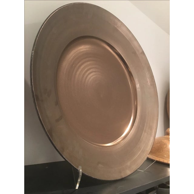 Elegant decorative plate by artist Gary McCloy. Smooth metallic glaze finish on ceramic. 26" diameter. Plate comes with a...