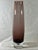 Large Swedish-style vase in amethyst colored glass Air bubble in the base No damage and no chips. 15.75"H x 3-75"W 2.75"...
