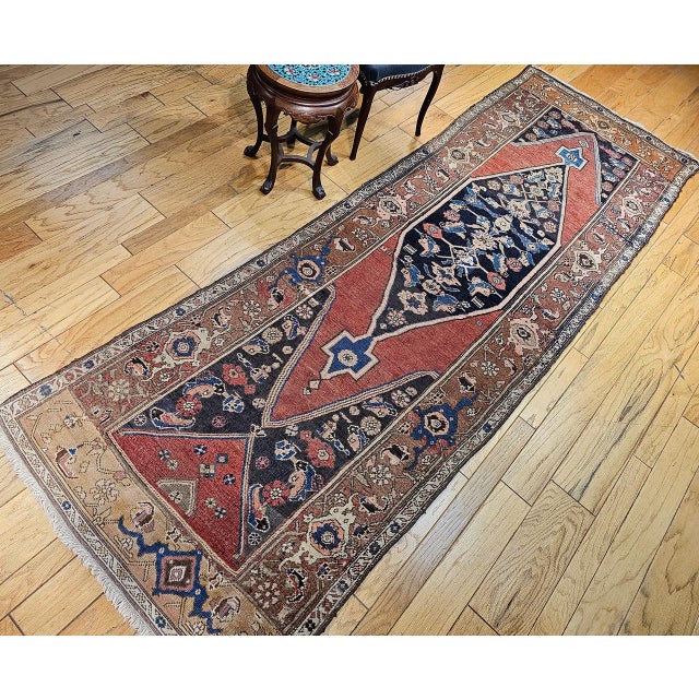 This outstanding late 19th-century Persian Bidjar wide runner is a true masterpiece of traditional weaving, celebrated for...