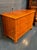 The 19th Century German Biedermeier Fruitwood Commode is an antique chest of drawers that exudes vintage charm and...