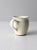 A charming vintage Nova Scotia studio pottery mug, hand-crafted and signed by artist D. Kryzalka. The generously...