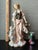 This beautiful vintage Italian sculpture by renowned artist Amilcare Santini features a tender depiction of a mother and...