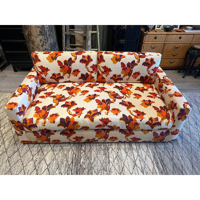 Fantastic Contemporary Sofa Reupholstered in Vintage 70's Dead Stock Fabric. Features a vibrant vintage fabric from the...