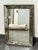 Design Plus Gallery presents an Oxidized to Antiqued Faceted Panel Wall Mirror from Agnew Associates. The mirror has a...