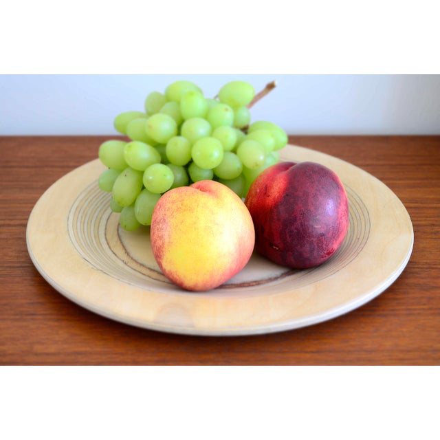 Birch wood plate or bowl by the Finnish designer Eero Saarinen. This piece has an attribution mark, I am sure that it is...