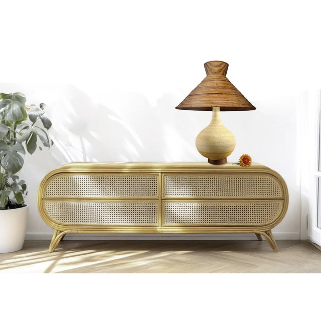 Soaked reed becomes supple; carefully bent, angle-cut and nailed together to create the appearance of one continuous ring....