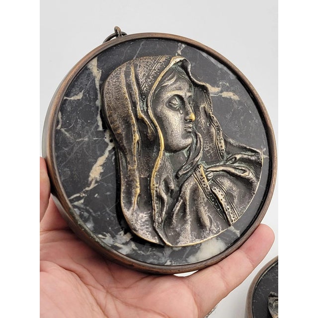 This rare and one-of-a-kind antique wall hanging features beautiful bronze and green marble plaques depicting Jesus and...