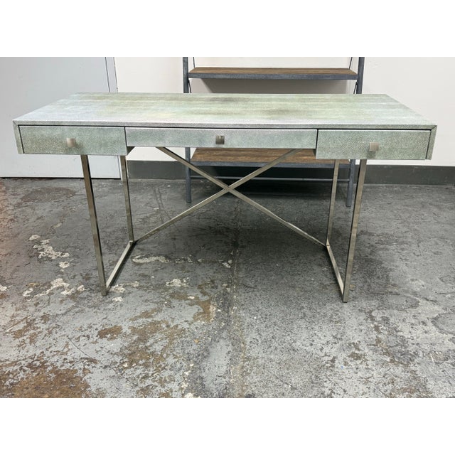 Design Plus Gallery presents the Avalon Faux Shagreen Desk by Hettler Tullmann for CB2. This desk has a grey faux shagreen...