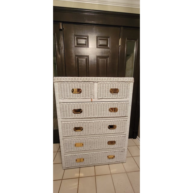 1980's Henry Link style coastal 6 - drawer wicker dresser. It is designed in a coastal campaign style and features...