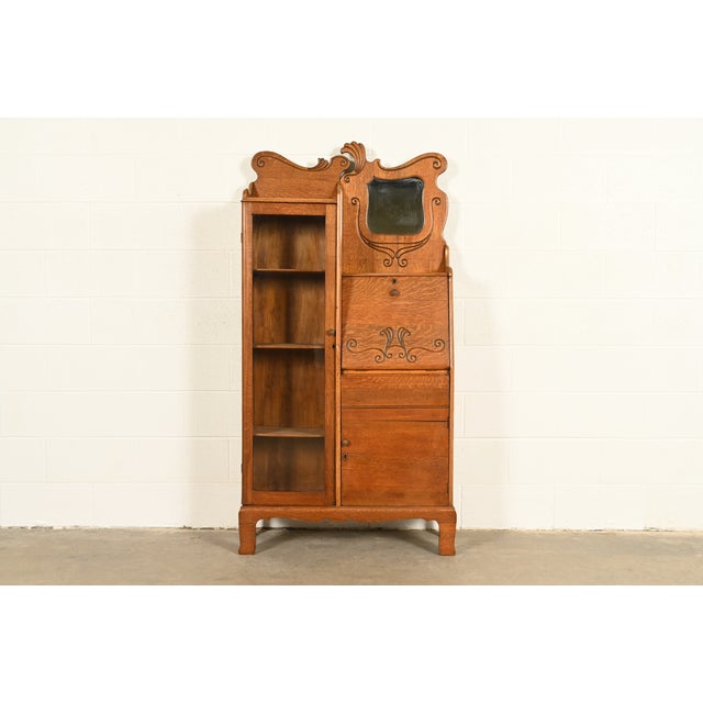A gorgeous antique Victorian side-by-side drop front secretary desk and bookcase or display cabinet In the manner of...