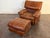 1970's brown leather lounge chair by Roche Bobois in good vintage condition. Patinated leather all around. Unsigned....