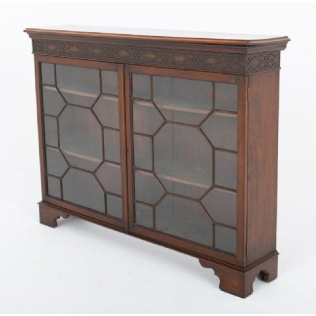 Mahogany Georgian glazed side cabinet bookcase. This cabinet is raised upon bracket feet. Period: Georgian antique circa...