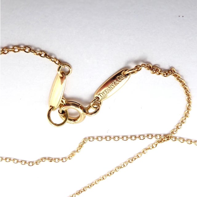 Mid 20th Century Tiffany & Co. Peretti Yellow Gold Large Open Heart Rock Crystal Necklace For Sale In Philadelphia - Image 6 of 9