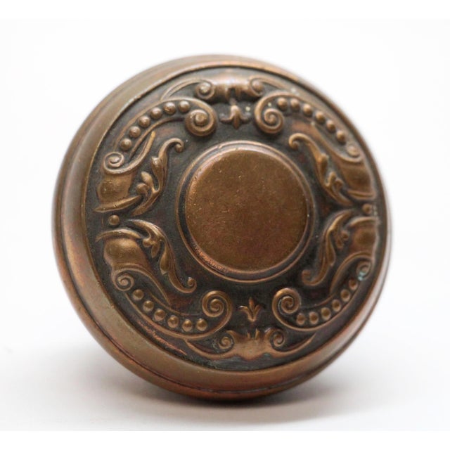This Flemish style two fold brass passage door knobs were made by Corbin in the 1905 catalog. It is part of the F-22400...