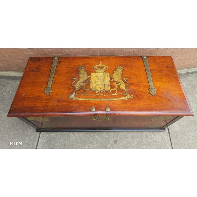 A large early 20th Century Royal Dutch Brass Inlaid Coat of Arms Teak Storage Coffer. Recently restored inside out....
