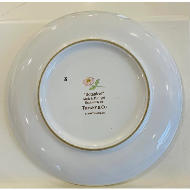 [Please see my other listing for a matching set of four coffee mugs.] Tiffany & Co. "Botanical" plate from their...