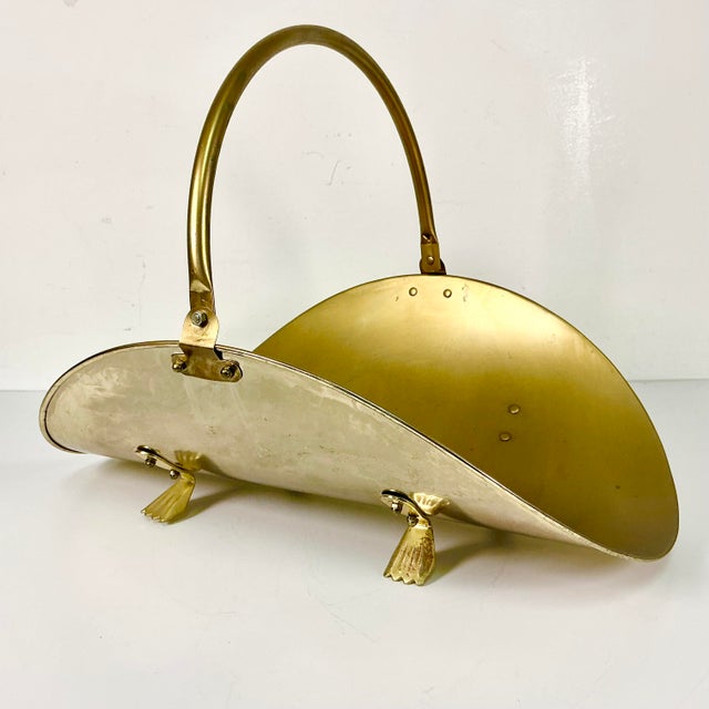 A classic old Gold Matte finished metal Arts & Crafts Federal style Firewood Holder. It features four brass paw feet and...