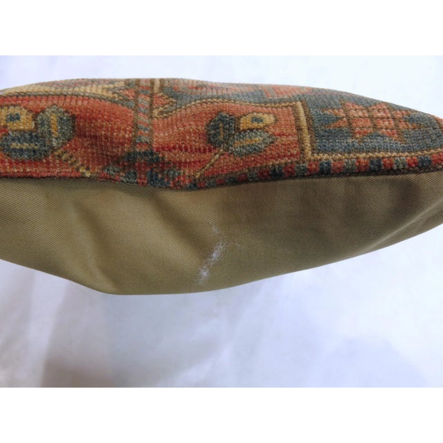 One of a kind Pillow made from a vintage afghan rug with cotton back. Zipper closure and foam insert provided. 15'' x 16''