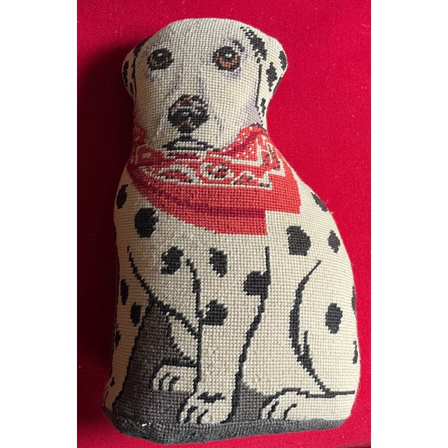 Hand made needlepoint dog pillow in the form of a spotted dalmatian wearing a red bandana. May also be used as a doorstop....