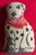 Hand made needlepoint dog pillow in the form of a spotted dalmatian wearing a red bandana. May also be used as a doorstop....