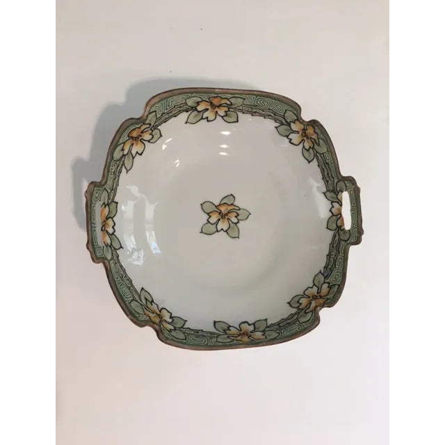 Nice and earthy small dish with very interesting raised and textured geometric pattern as a border. I love the softly...