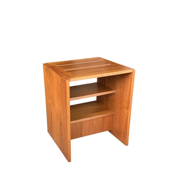 This modern Danish side table showcases clean Scandinavian lines and a beautifully balanced, minimalist silhouette....