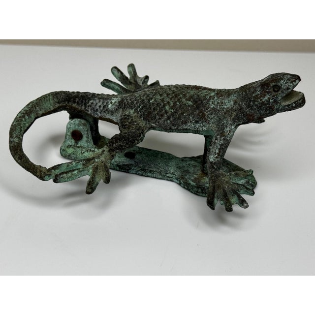 A striking American Arts and Crafts bronze door knocker modelled as a gecko or lizard, dating to approximately 1915 and...