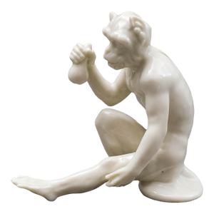 Mid 20th Century Nymphenburg Germany White Porcelain Monkey Figurine Holding Fruit