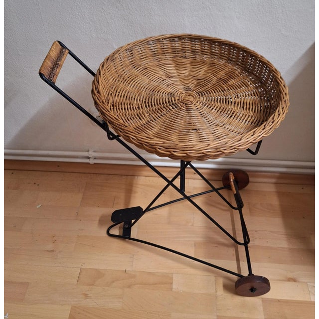 Vintage Tea Trolley with Newspaper Shelf in Black Iron Frame, Teak Wheels and Removable Wicker Tray, 1970s For Sale - Image 3 of 9